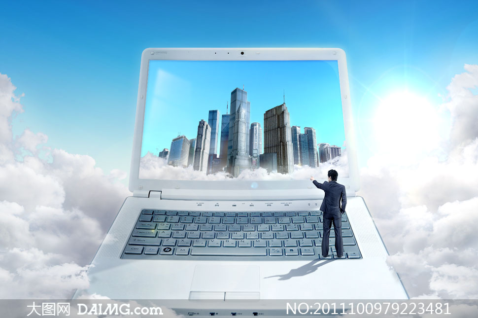 站在笔记本电脑键盘上的人物创意psd分层素材