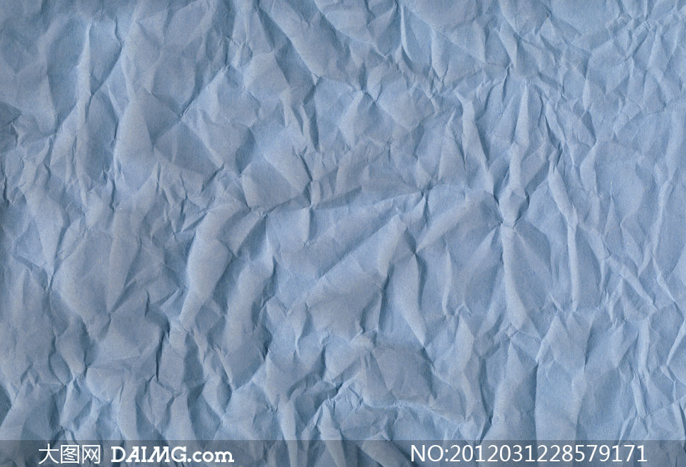 蓝色褶皱纸张底纹背景高清图片